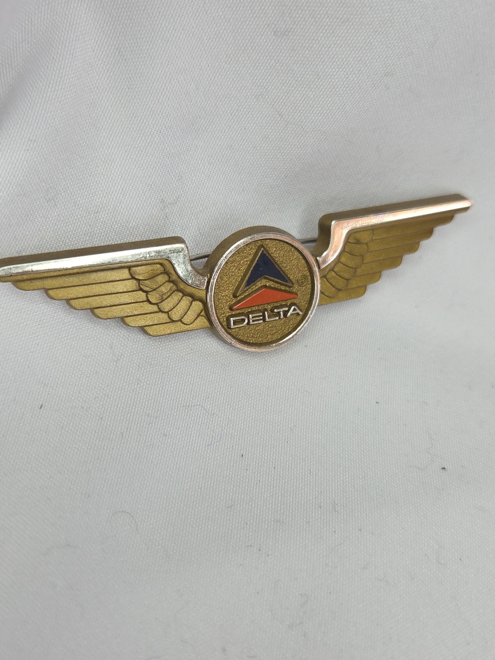 Vintage Delta Gold Winged Pilot Pin with Red Blue Logo 1990s Plastic